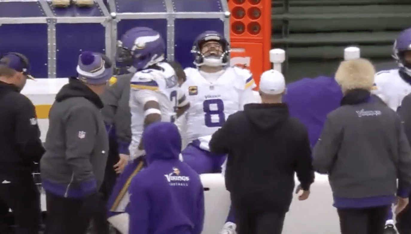 Kirk Cousins carted off