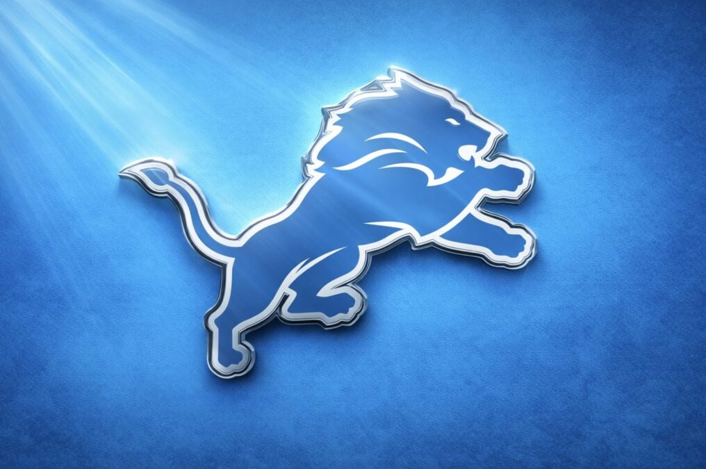 Create a feature image that includes a metallic Detroit Lions logo and a cool light blue background Detroit Lions sign Jamel Dean